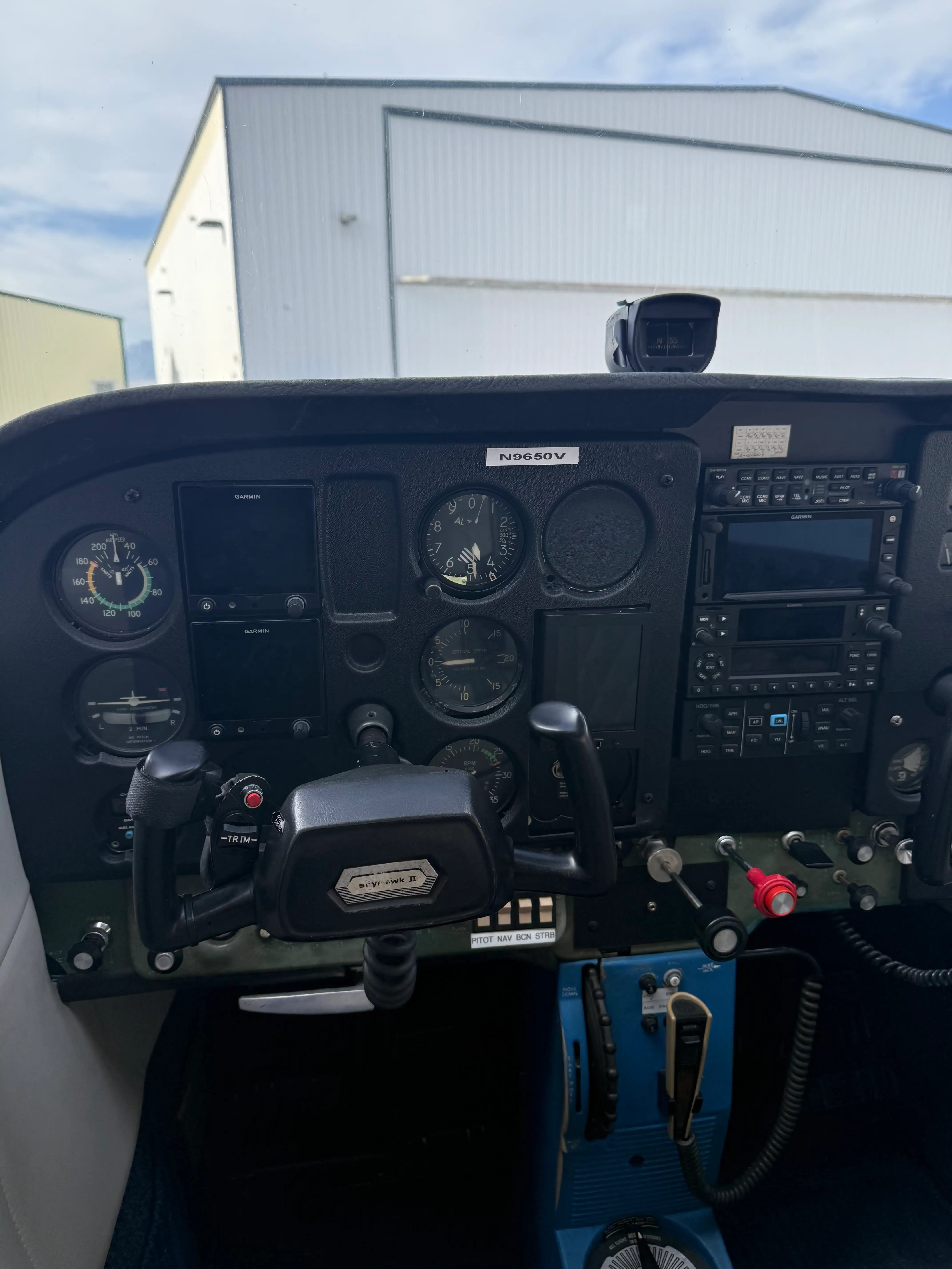 View of the instrument panel from inside the cockpit of an aircraft