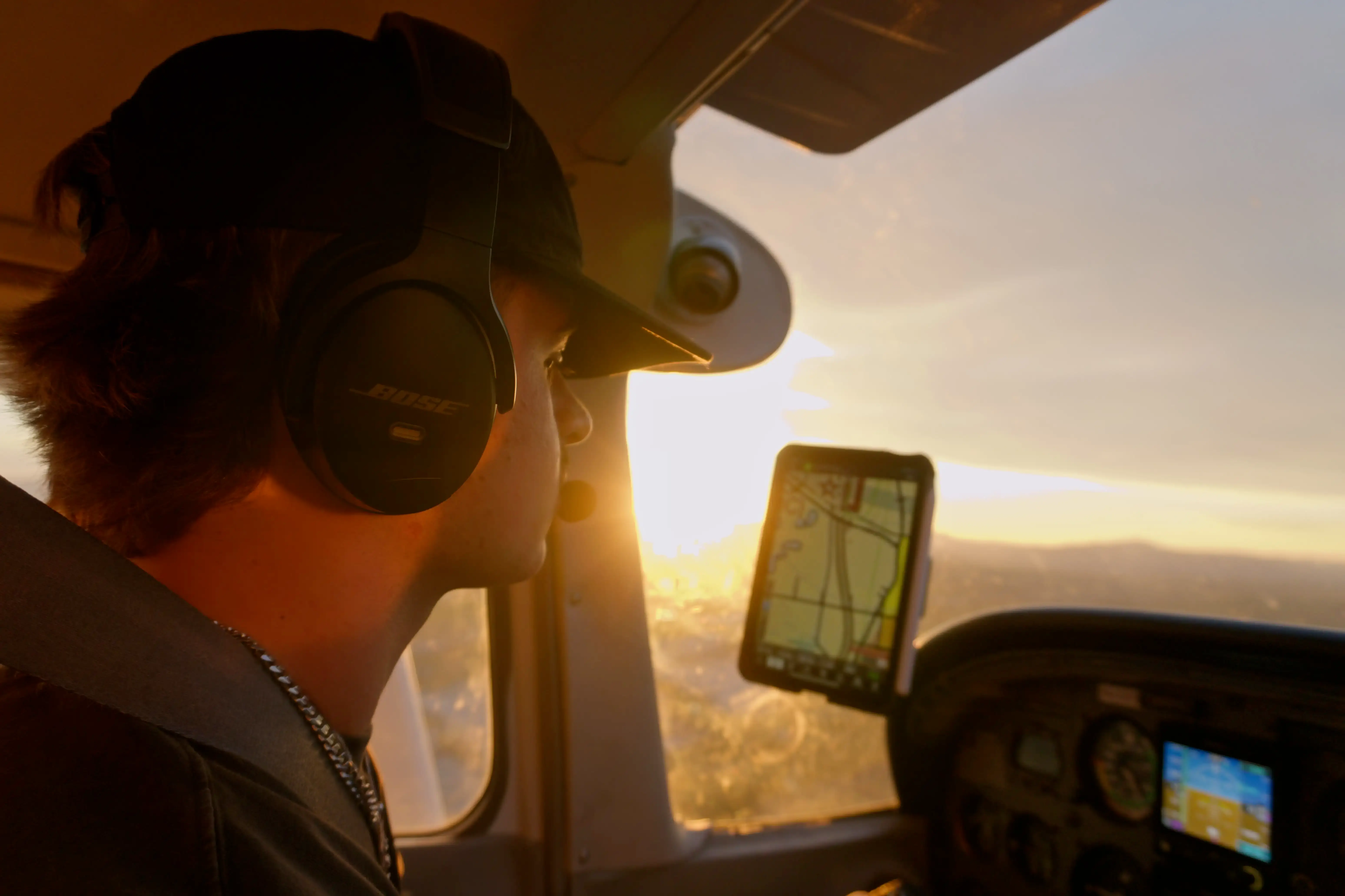 Inside cockpit view of Cessna 172XP high performance aircraft on sunset