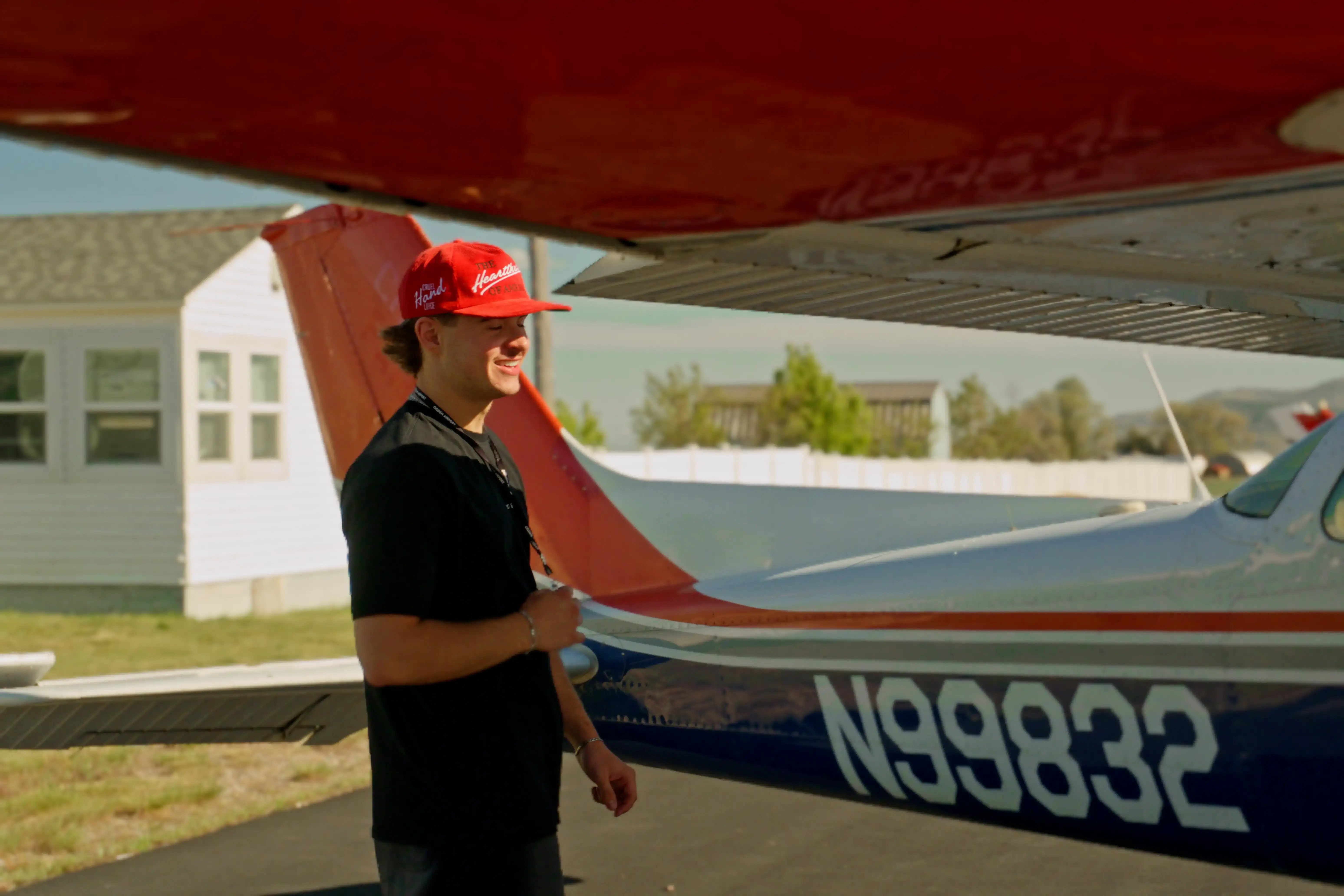 Student next to Cessna out of the hangar at Blitz Aviation in Ogden, Utah